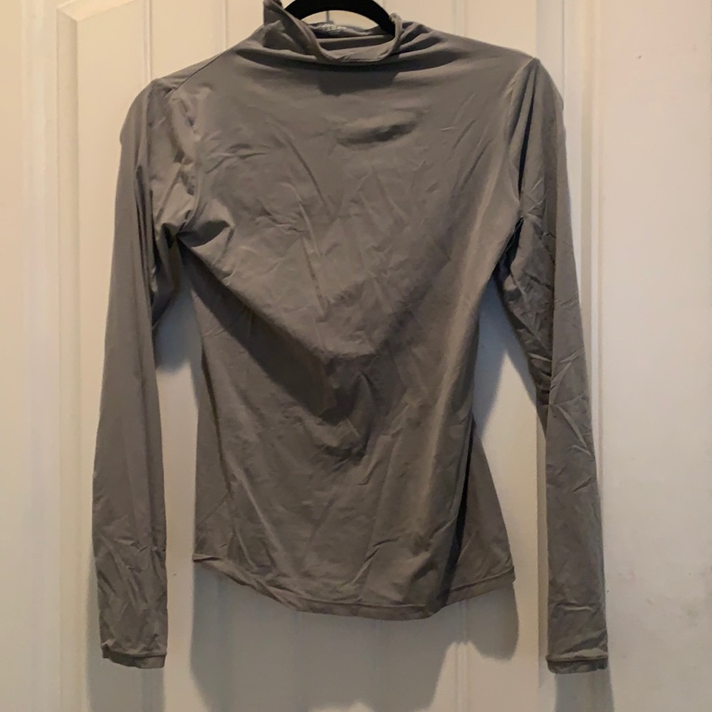 Never worn, size medium, gray, Skims shape wear top,  long sleeved, mock neck
